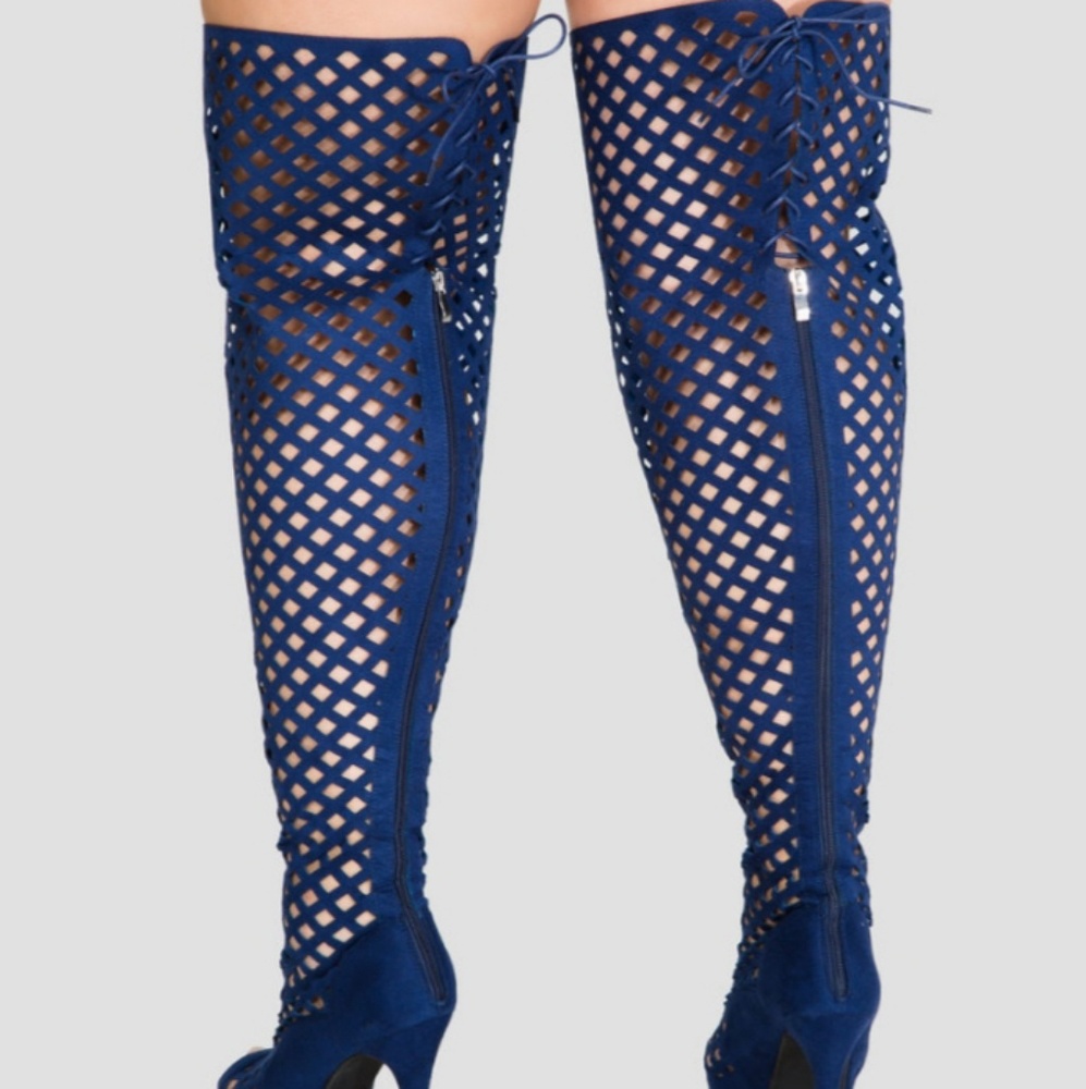 Thigh high cage boots